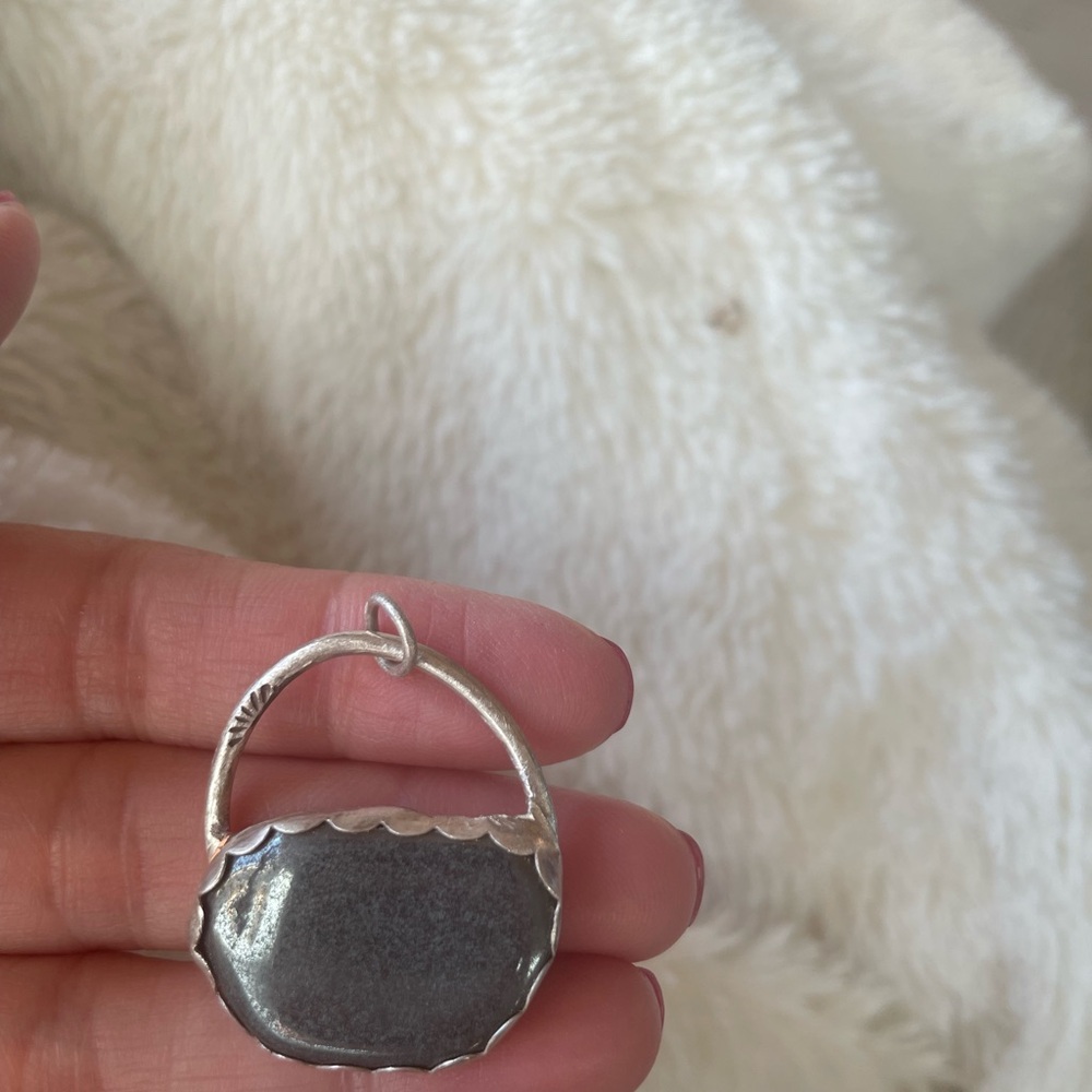 Silver and hematite pendant